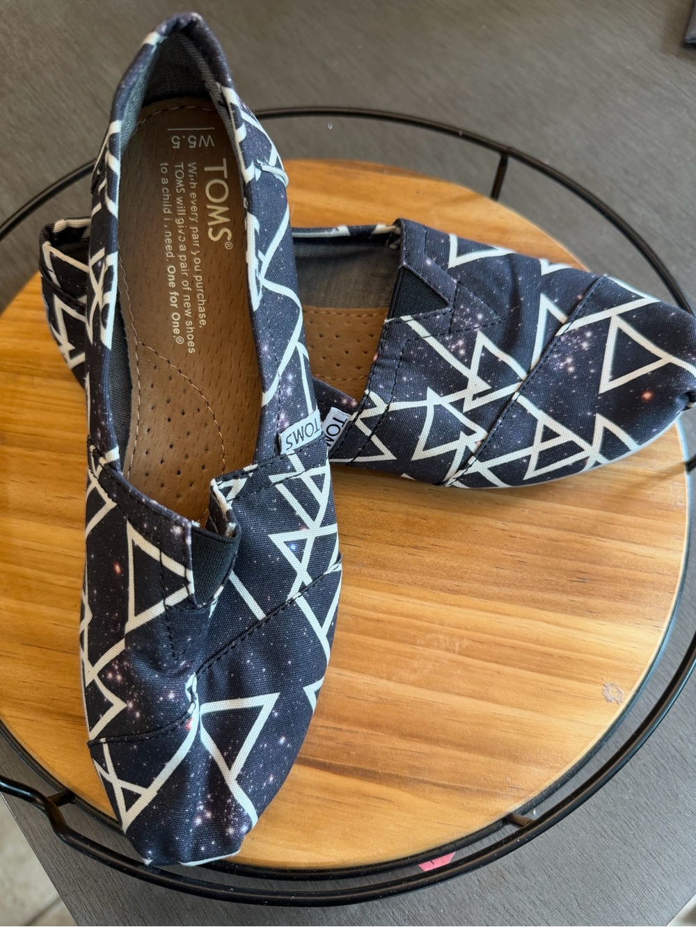 TOMS Women’s Black Geometric Print Slip-Ons